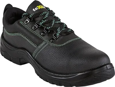 A black safety shoe with green laces and stitching.