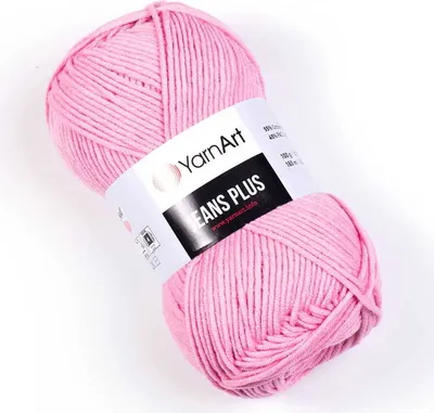 A ball of pink yarn on a white background.