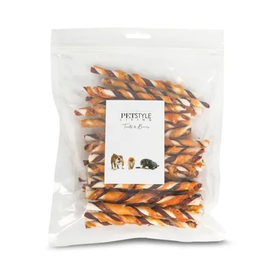 A clear plastic bag containing twisted dog treats, with a white label in the center.