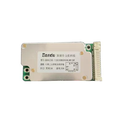 A battery protection board with text labels and connectors.