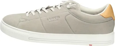 A side view of a single men's sneaker.