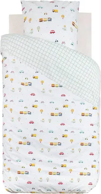 A top-down view of a child's duvet cover and pillowcase set with a playful pattern of trains, cars, and hot air balloons.