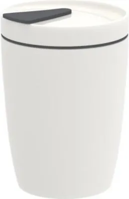 A white coffee mug with a dark gray lid.