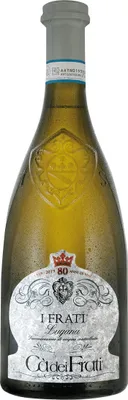 A bottle of white wine against a white background.