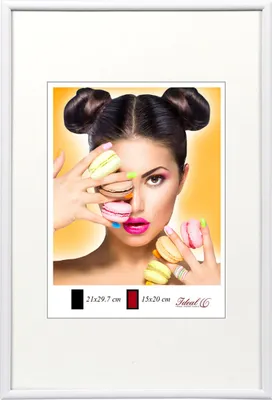A white picture frame with a mat, showcasing a vibrant image of a woman with macarons.