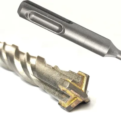 A close-up, studio shot of a drill bit against a white background.