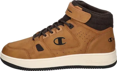 Side view of a single brown Champion sneaker.