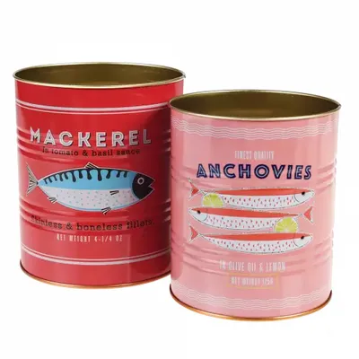 Two decorative tin cans designed to look like mackerel and anchovy tins.