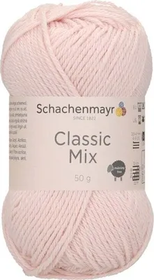 A ball of pink yarn with a label.