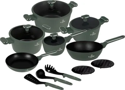 A collection of cookware and kitchen utensils arranged on a white background.