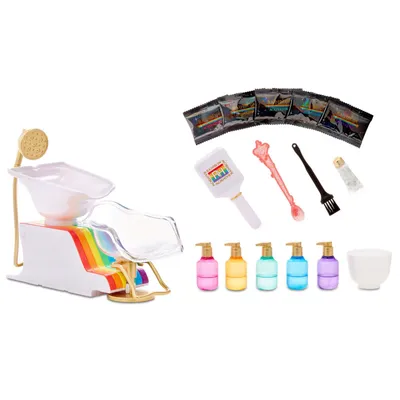 A collection of toy salon accessories, including a shampoo chair, bottles, and styling tools, arranged on a white background.