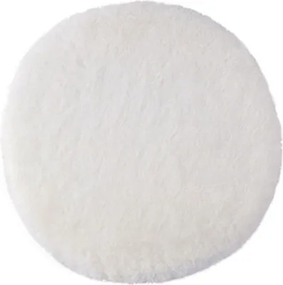 A round, fluffy white cushion is shown against a white background.