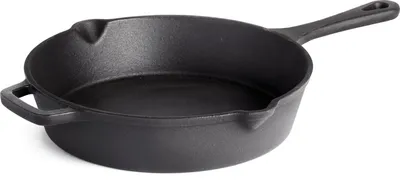 A black cast iron frying pan is shown from a slightly elevated side angle against a white background.