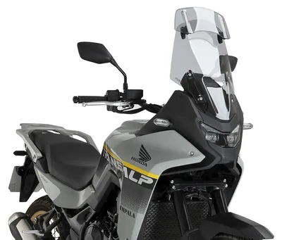 Zdjęcie produktu dla Wiatroszytna Puig Touring o wymiarach 460 x 338 mm z wizjerem, z certyfikatem ABE, przeznaczona do motocykli Honda XL750 Transalp, XL750 Transalp Eclutch, roczniki 2025-2026