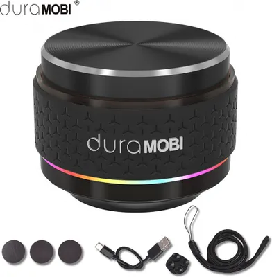 A product shot of a small, round, black speaker with a textured band and LED lights, along with its accessories.