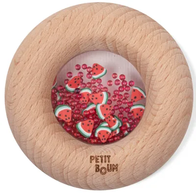 Immagine prodotto di Sonagli sensoriali a forma di ciambella con motivi fruttati - 7 x 7 x 2 cm - Rosa | di Petit Boum
