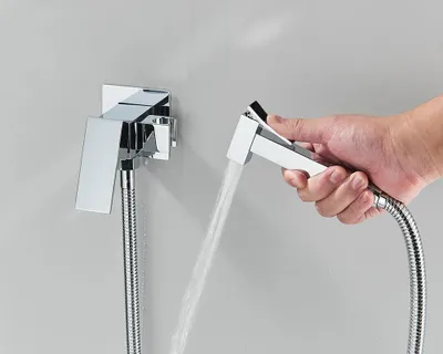 Immagine prodotto di Doccetta per bidet - Miscelatore a parete - 2 fori - Acqua calda/fredda - Getto orizzontale - Doccetta per WC - Bianco