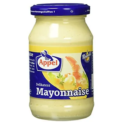 A jar of mayonnaise on a white background.