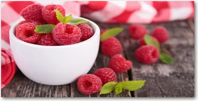 Produktbild von Tulup® Glas-Bild - 100x50 -Wandkunst - Wandbild hinter gehärtetem Sicherheitsglas  - Essen & Getränke - Himbeeren Schüssel - Rot