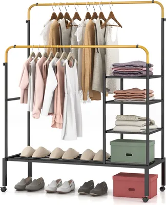 A double-tiered garment rack with clothes hanging on it and shelves with folded clothes and a storage box.