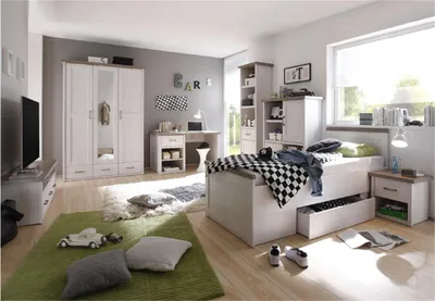 A child's bedroom with a bed, wardrobe, desk, and TV stand.