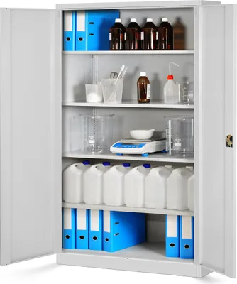 Interior view of a metal storage cabinet filled with laboratory or office supplies.
