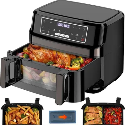A black air fryer with a transparent drawer showing a whole roasted chicken and vegetables inside. Accessories are shown below.