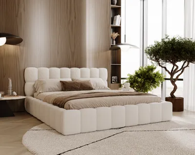 A bedroom scene with a bed, nightstand, and a plant.