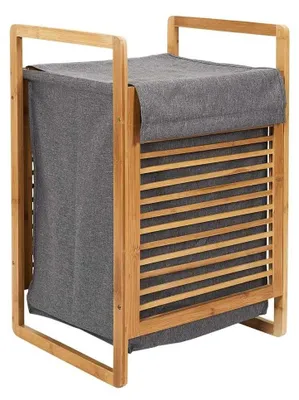 A laundry basket made of bamboo and gray fabric.