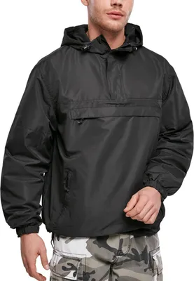 A man wearing a black hooded jacket and camouflage pants, shown from the chest up against a white background.