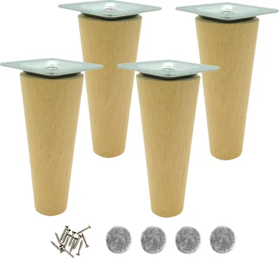 Four wooden furniture legs with metal plates and screws and felt pads on a white background.