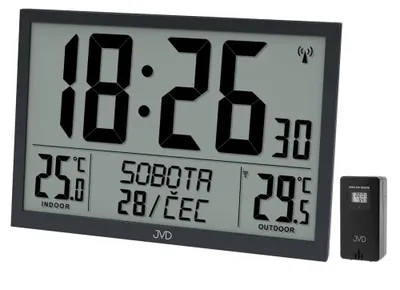 A digital clock with an outdoor sensor.