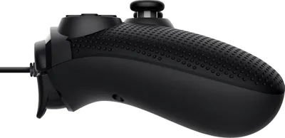 A side view of a black gaming controller.