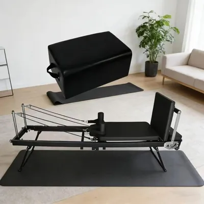 Produktbild von Pilates Reformer - Heimfitnessgerät - Mit quadratischer Box - Mit Pedal - Stabiler Eisenrahmen - Tragbar, multifunktional - Schwarz