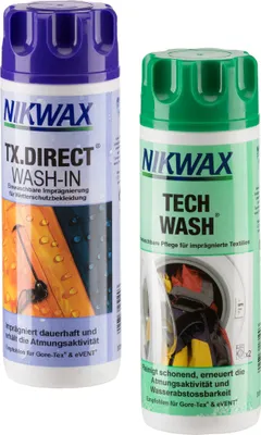 Two bottles of Nikwax cleaning and waterproofing products for outdoor gear.