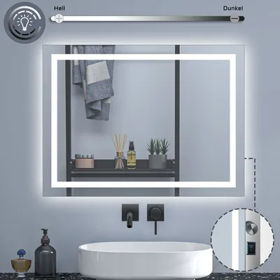 A bathroom mirror with integrated LED lighting above a sink and faucet.