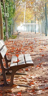 Produktbild von Wallario Design Wanduhr Einsame Parkbank an einer Allee - Herbststimmung aus Echtglas, Größe 30 x 60 cm