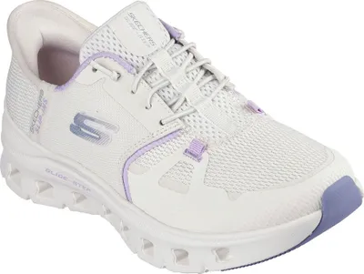 A white and purple Skechers women's sneaker is shown against a white background.
