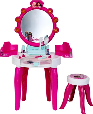 A Barbie-themed toy vanity set with a mirror, stool, and accessories.