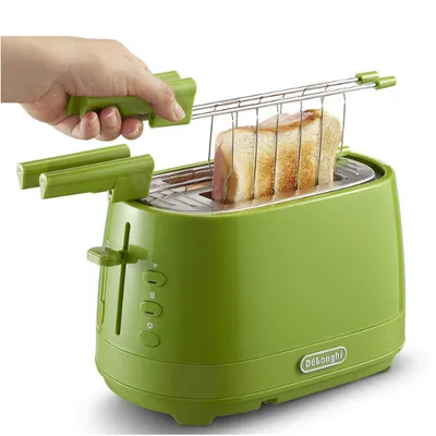 A hand is using a green toaster to toast bread. The toaster is lime green and has a chrome finish on the top. The bread is golden brown and is being held up by a metal rack.