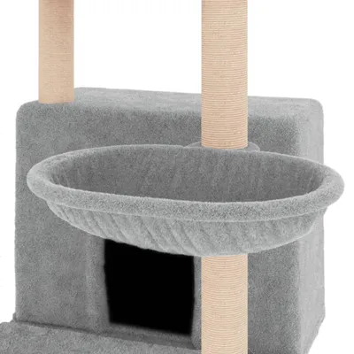 A close-up view of a grey cat tree with sisal scratching posts and a basket.