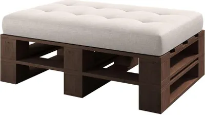 A tufted white cushion sits atop a dark brown wooden pallet-style base, presented against a white background.