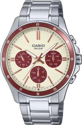 A close-up studio shot of a Casio men's watch with a silver band, cream dial, and red accents on the bezel and subdials.