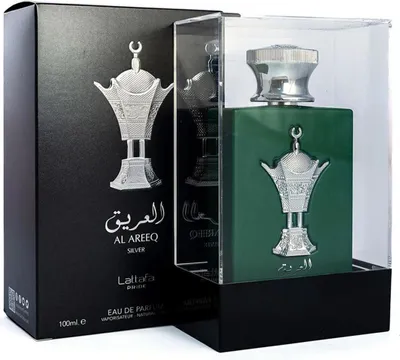 A perfume bottle and its packaging are displayed on a black base against a white background.