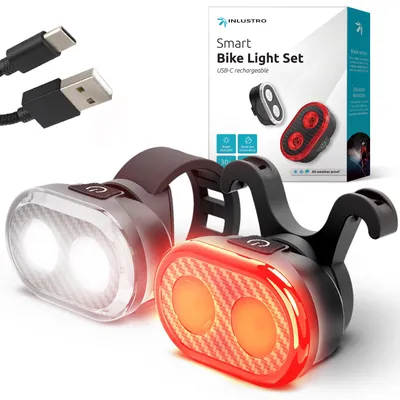 Produktbild von Inlustro Fahrradbeleuchtung Set - LED Vorder- und Rücklicht mit Bremssensor, Sattelbefestigung, USB-C Aufladbar, Wasserdicht IPX6, Rot/Weiß