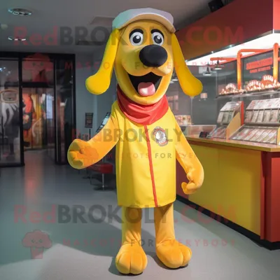 Immagine prodotto di Personaggio del costume della mascotte REDBROKOLY degli hot dog gialli vestito con una giacca a vento e bretelle