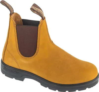 A single yellow Blundstone Chelsea boot is shown against a white background.