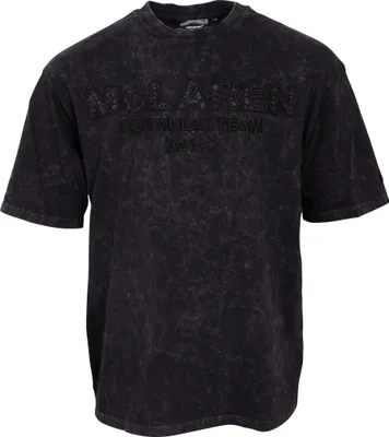 Produktbild von McLaren F1 T-Shirt Washed New Era, Offizieller Fanartikel, Schwarzes Oversized Shirt mit tonalem McLaren-Lettering und Mineral-Wash-Effekt, 100% Baumwolle