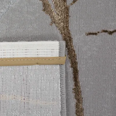 Produktbild von Designer Teppich mit abstraktem glänzenden Ästemuster gold Größe - 80 x 300 cm
