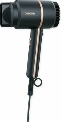 A black and gold Beurer hair dryer is shown against a white background.